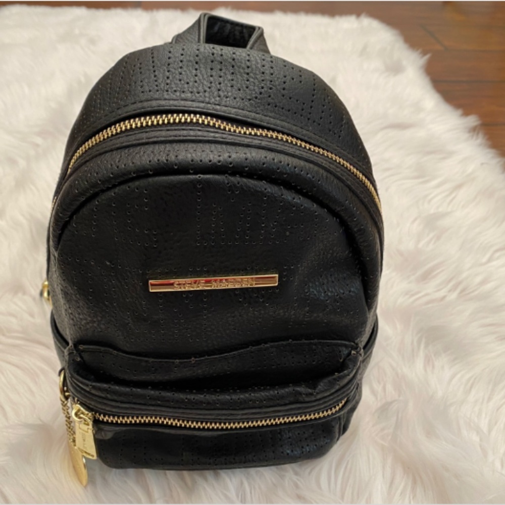 Steve Madden Black Mini Backpack + Adjustable Straps, Laser Cut Spelled Out Logo